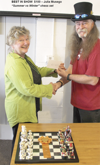 Julia Musengo's Chess Set "Summer vs Winter"